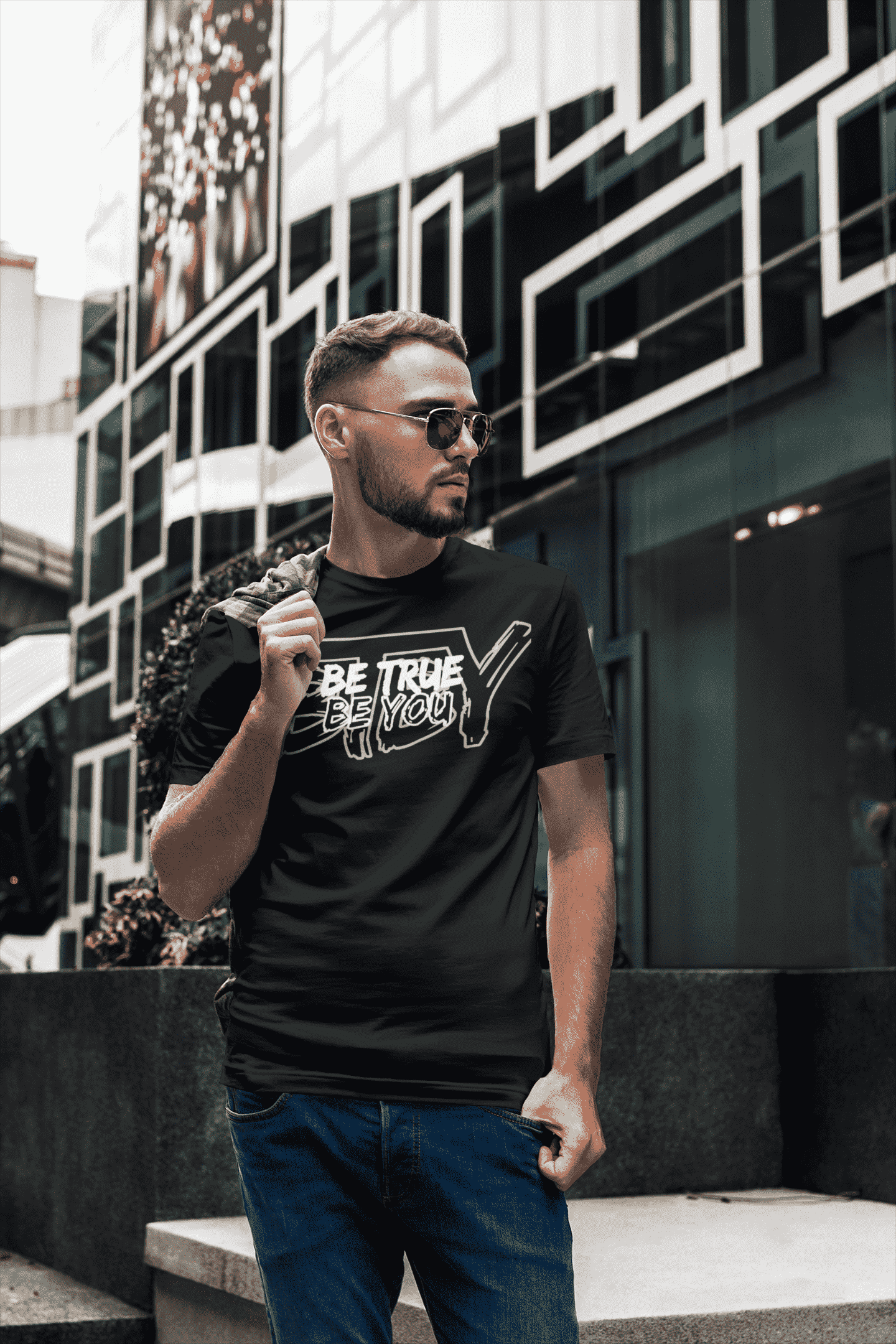 t-shirt-mockup-of-a-bearded-man-posing-next-to-a-cool-building-2816-el1-min